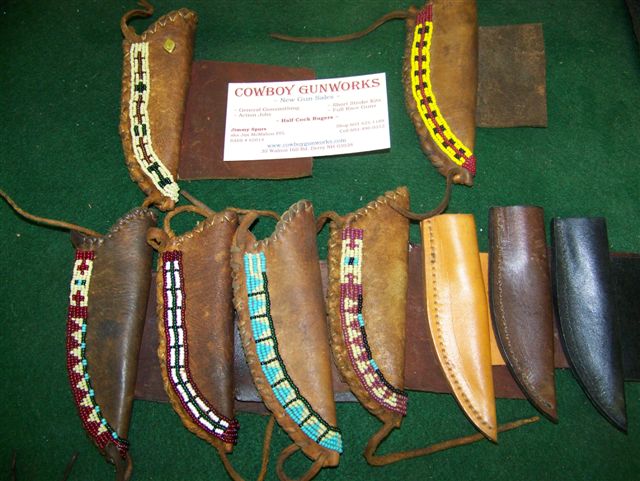 Various plain and beaded sheaths for RedWing Knives.