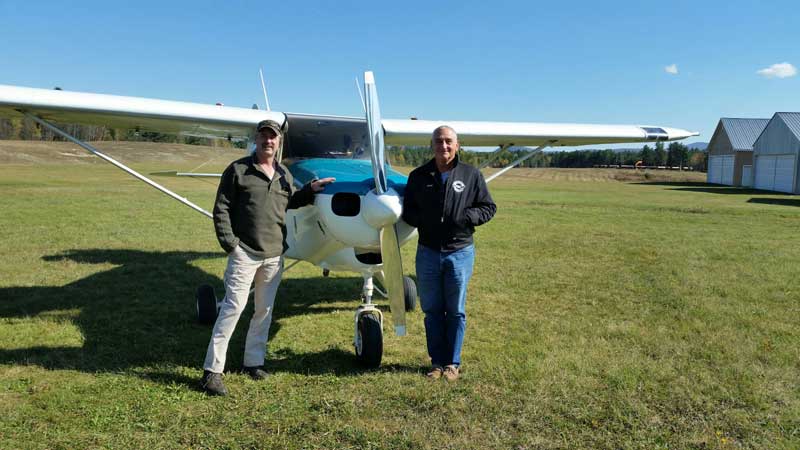Jimmy with his instructor Bob Casian when Jimmy earned his Private Pilot license.