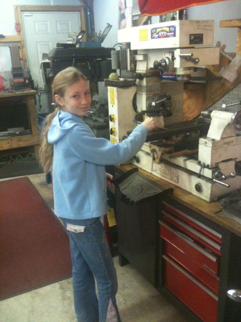 Jenny cleaning the machines.