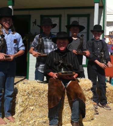 Rattlesnake Wrangler (sitting) 2012 SASS Buckaroo National Champion